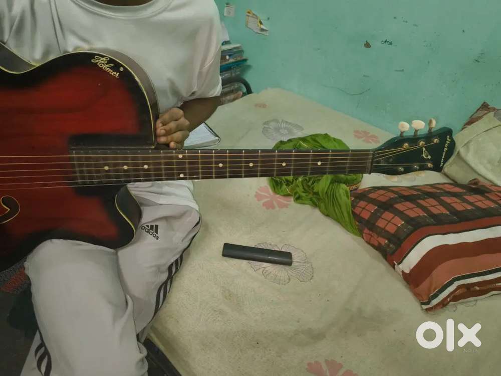 Guitar holmer