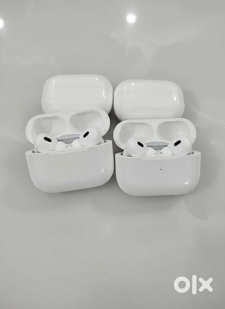 Apple AirPods Pro (2 Sets) with Charging Cases - Used, Good Condition
