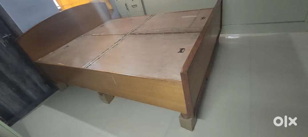 Wooden double bed with storage