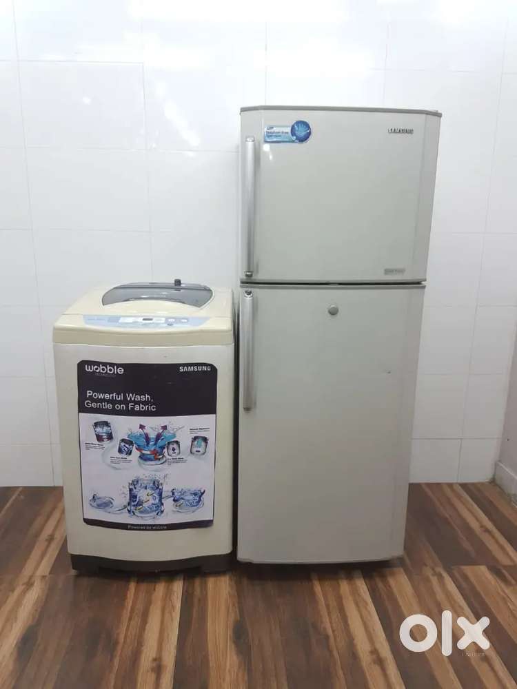 Samsung double white colour refrigerator with top load machine**&