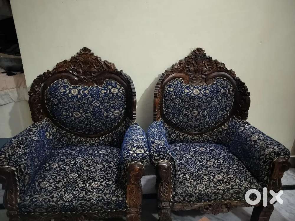 Blue sofa with yellow flower