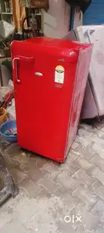 Red colour single door fridge proper working condition good cooling