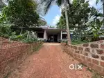 22 cent plot with house for sale 1km from NH
