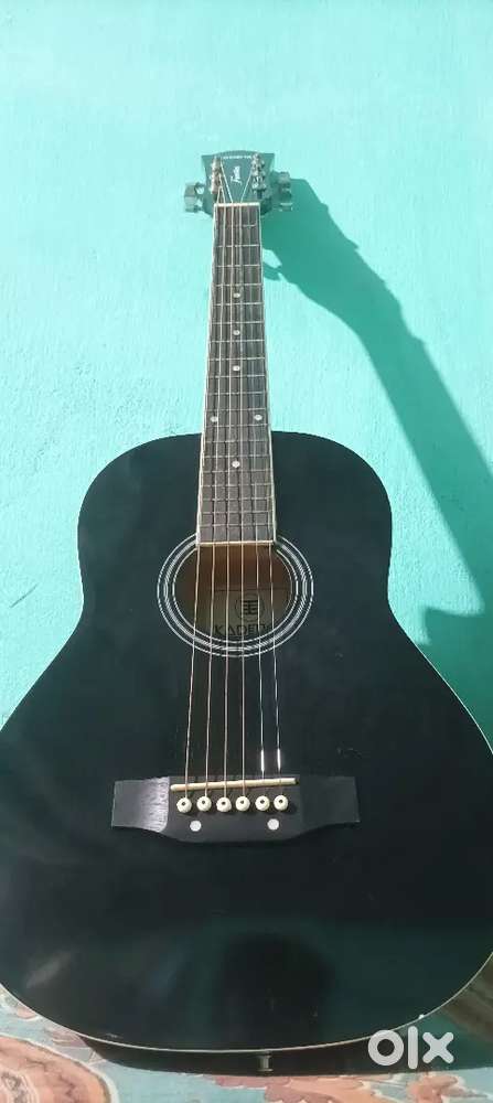 KADENCE ACOUSTIC GUITAR FOR SELL WITH COVER.