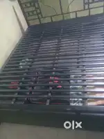 Black metal bed