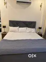 Bed+ curtains + bedside tables+ table lamps