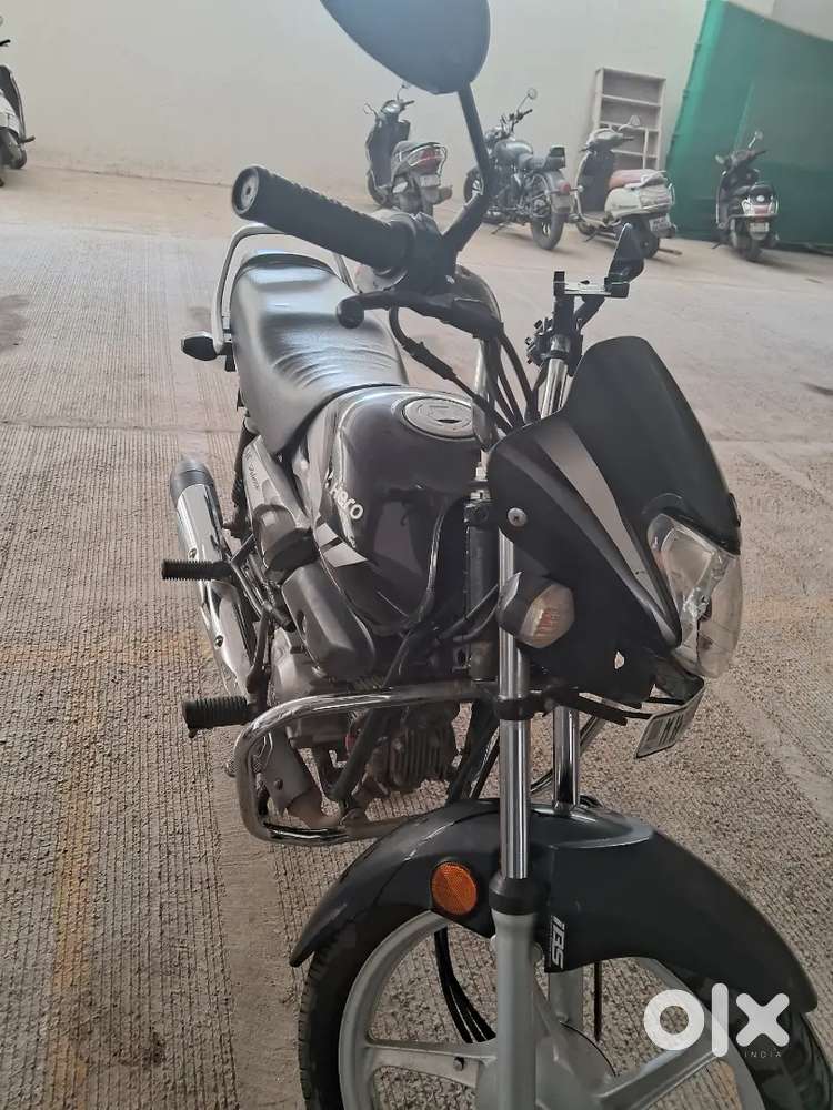 With extra lock, mobile holder, seat cover, just serviced