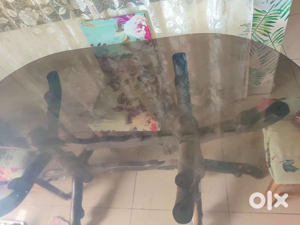 Glass brown dining table ( only Dining table )