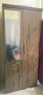 Wardrobe, Sofa cum bed, Table