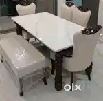 Luxurious marble dinning table adds a touch of sophistication