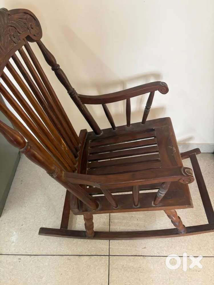 A beautifully crafted sagwan wood chair .