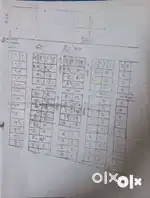 Open plot behind Laxmi Mega township