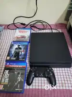 PS4 SLIM 1TB WITH 3 GAMES