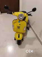 Vespa battery rechargeable scooter for kids