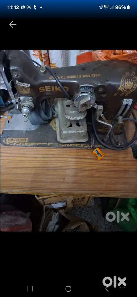 EMBROIDERY CUM SEWING MACHINE