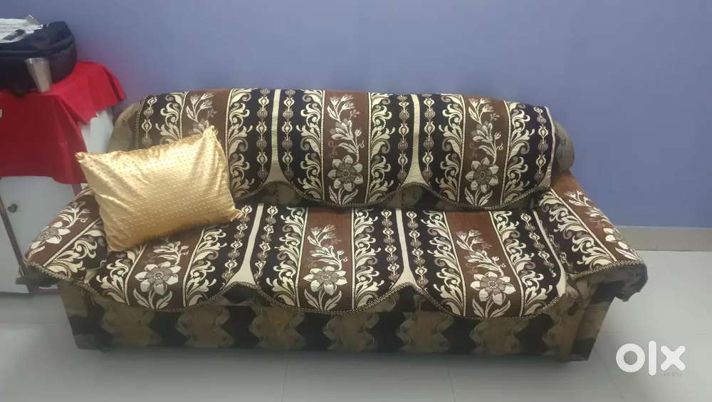 Single sofa and wodden Almirah