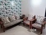 Teak wood 5 seater sofa in good condition