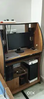 computer with computer table and speakers