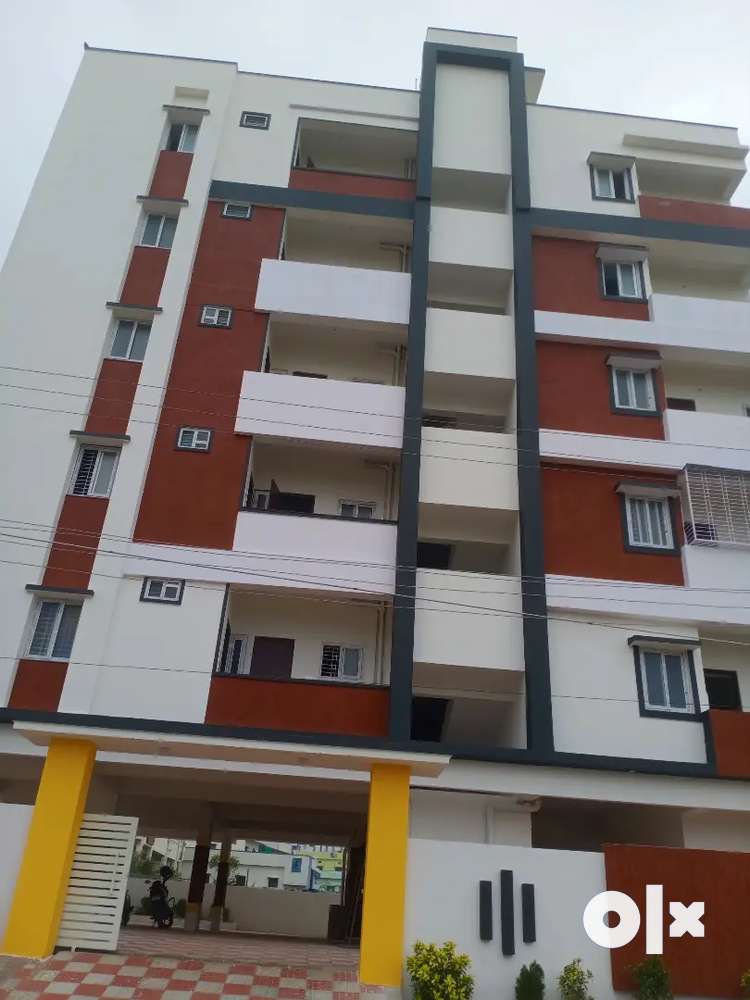 Semi furnished 2bhk flat(1055 sft ) 1 year old including carparking.