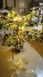 Artificial tree, yellow lighting artificial leaf ganpati decoration