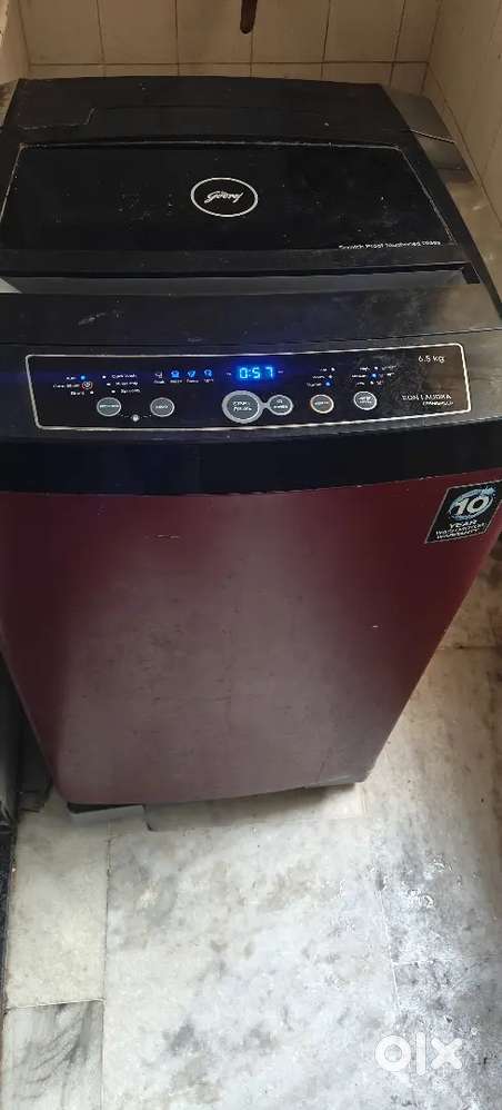 Top load fully automatic Washing machine with stand for sale