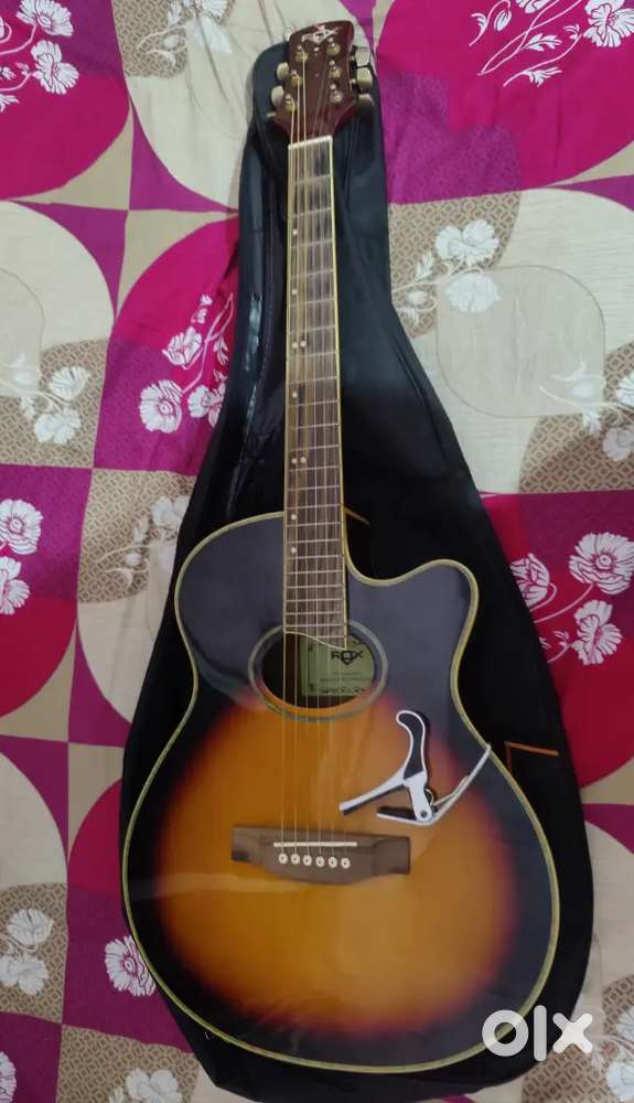 Acoustic guitar with capo