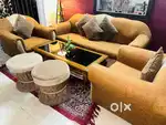 5 Seater Sofa along with Glass top Table with 2 side puffies