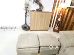 3 seater Sofa, with 2 poufs and a center table