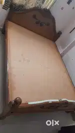 Wooden double size bed