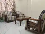 5 seater teak wood sofa along with centre table
