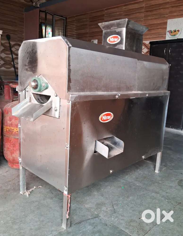 કેરી ના રસ નું મશીન