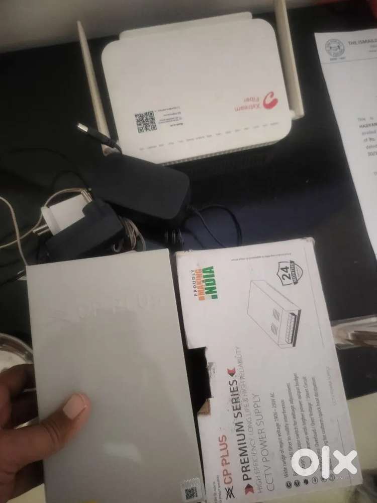 Cctv power supply, airtel wifi router and 3 adapters in good condition