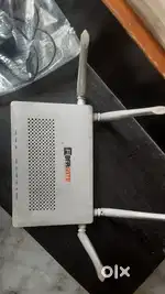 Router with adopter available for sell at reasonable price