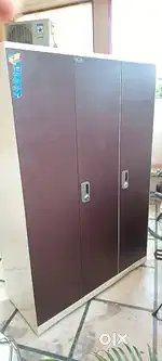 A newly bought big gordrej  3 door wardrobe