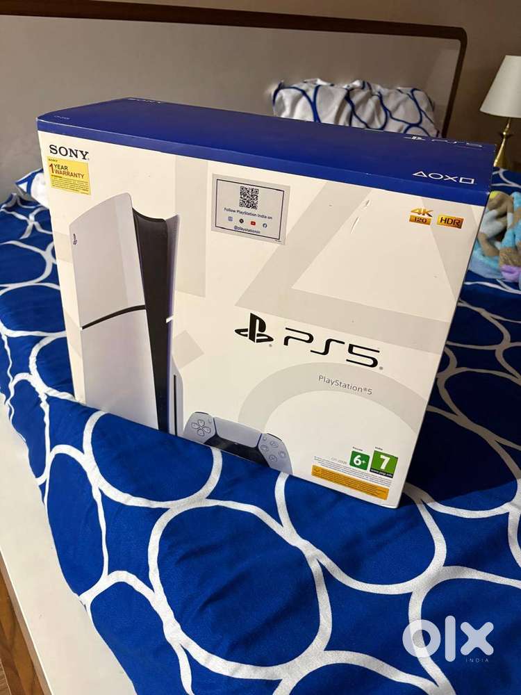 PS5 Slim Disc Edition with two controllers