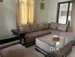 7 seater L shaped sofa with center table