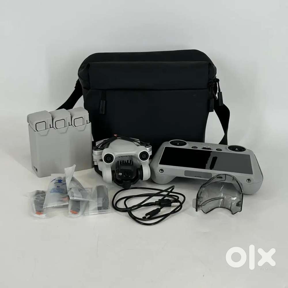 DJI Mini 3 Pro Drone Quadcopter w DJI RC RM330 3 Battery Case Excellen