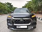 Maruti Suzuki Grand Vitara 1.5 Alpha Plus Dual Tone Intelligent Hybr..