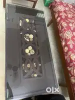 Living room table with top solid glass