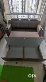 6 ft sofa cum bed with storage and cup holder