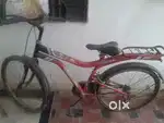 selling red colour bicycle