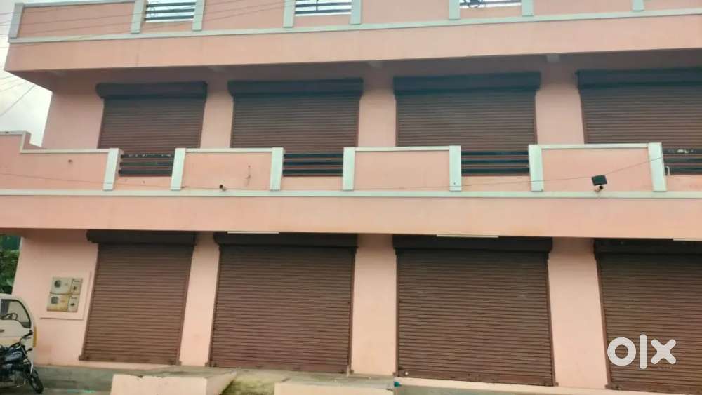 Commercial Building with shops is for sale