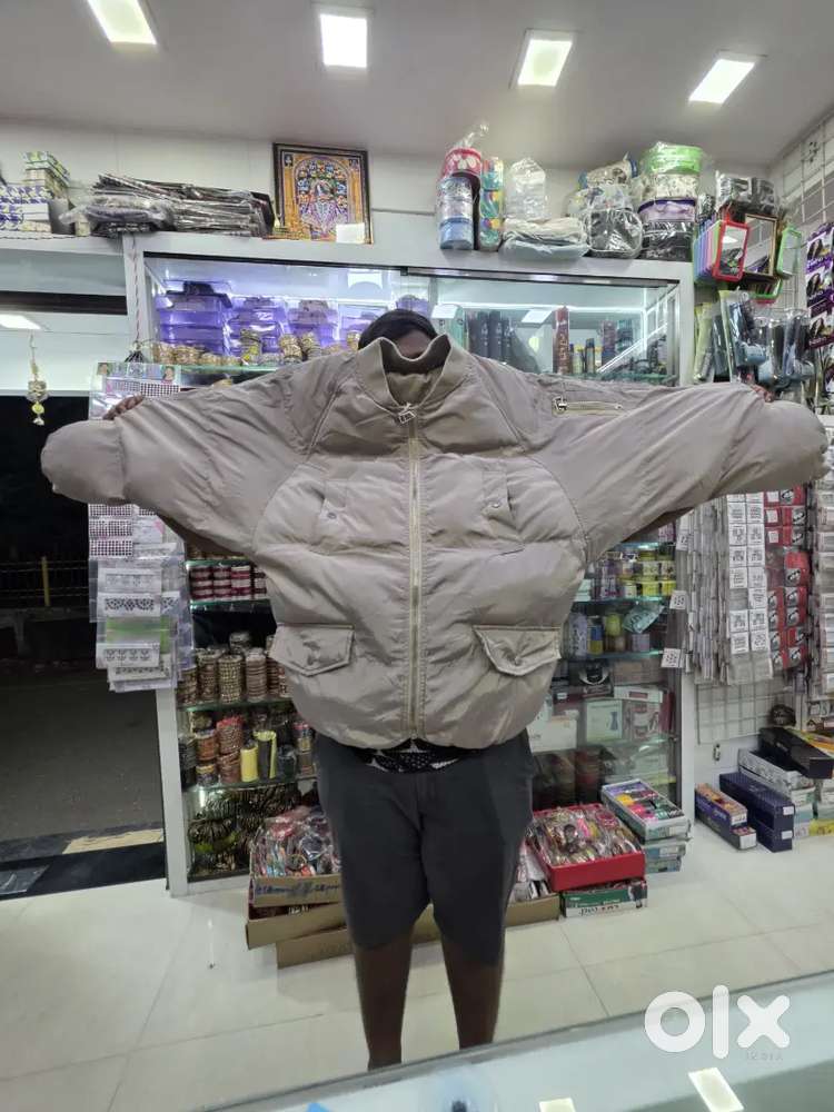 light brown puffer jacke