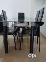 6 seater glass dining table with 5 chairs