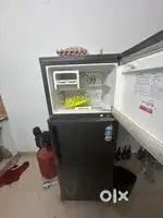 Selling my coat, mattresses and Fridge