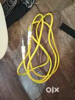 Electric guitar with amplifier and cable