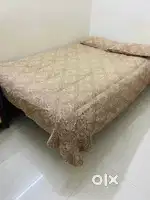 Bed with mattress and 2 pillows