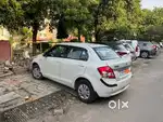 Maruti Suzuki Swift Dzire white 2014 Diesel very Good Condition.