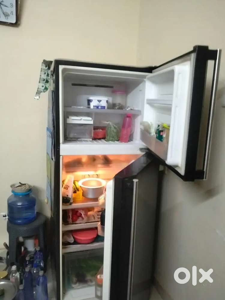 Double door fridge black good condition 277 litre storege