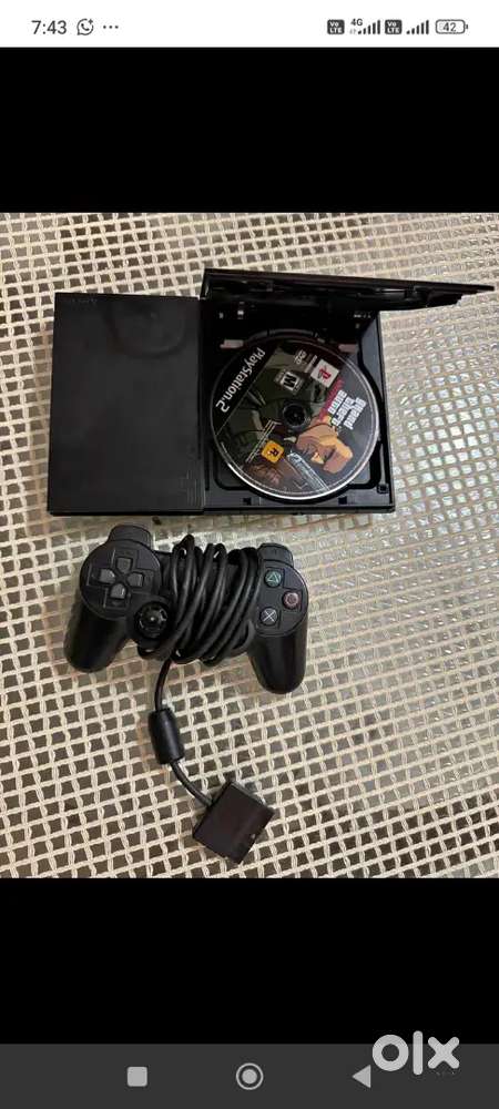 PS2 PLAYSTATION SLIM With games cds